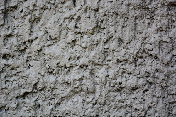 Steinmauer mit abstrakten Mustern — Stockfoto