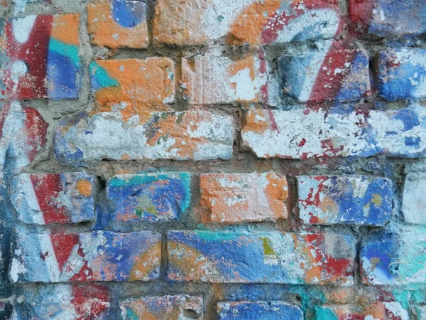 Old wall with colorful graffiti — Stock Photo, Image