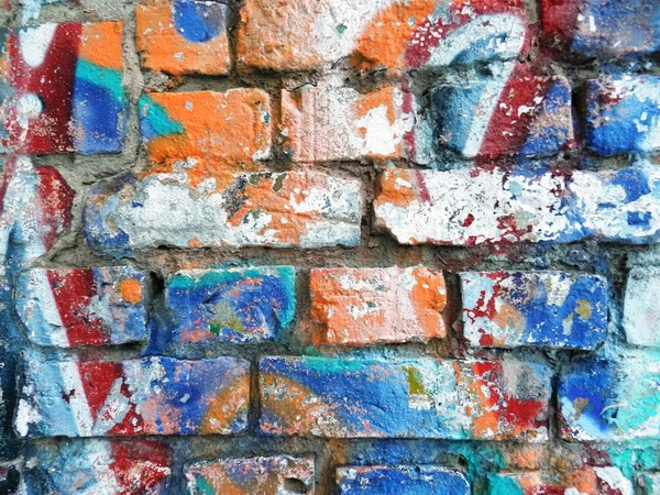 Old wall with colorful graffiti — Stock fotografie