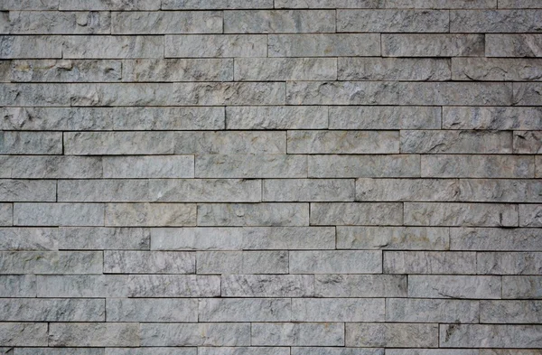Stone wall with abstract pattern — Stock Photo, Image