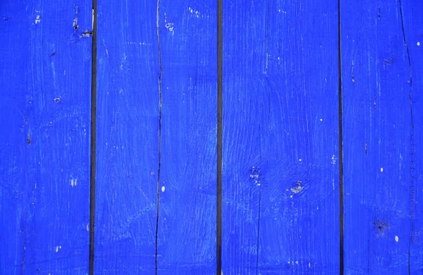 Peeling paint on grunge wooden surface — Stock Photo, Image