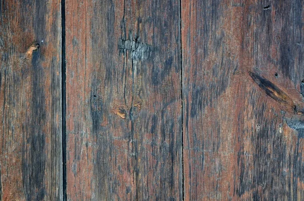 Peeling paint on grunge wooden surface — Stock Photo, Image