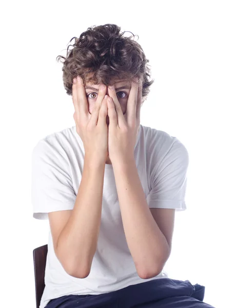 Boy hiding face with his hands — Stock Photo, Image