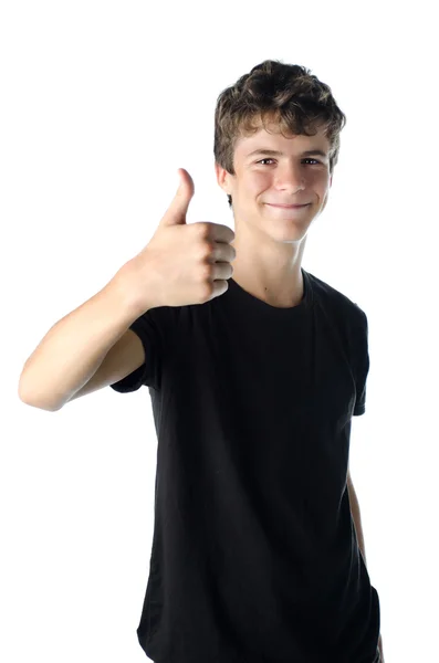 Teenage boy doing thumb up sign as OK — Stock Photo, Image