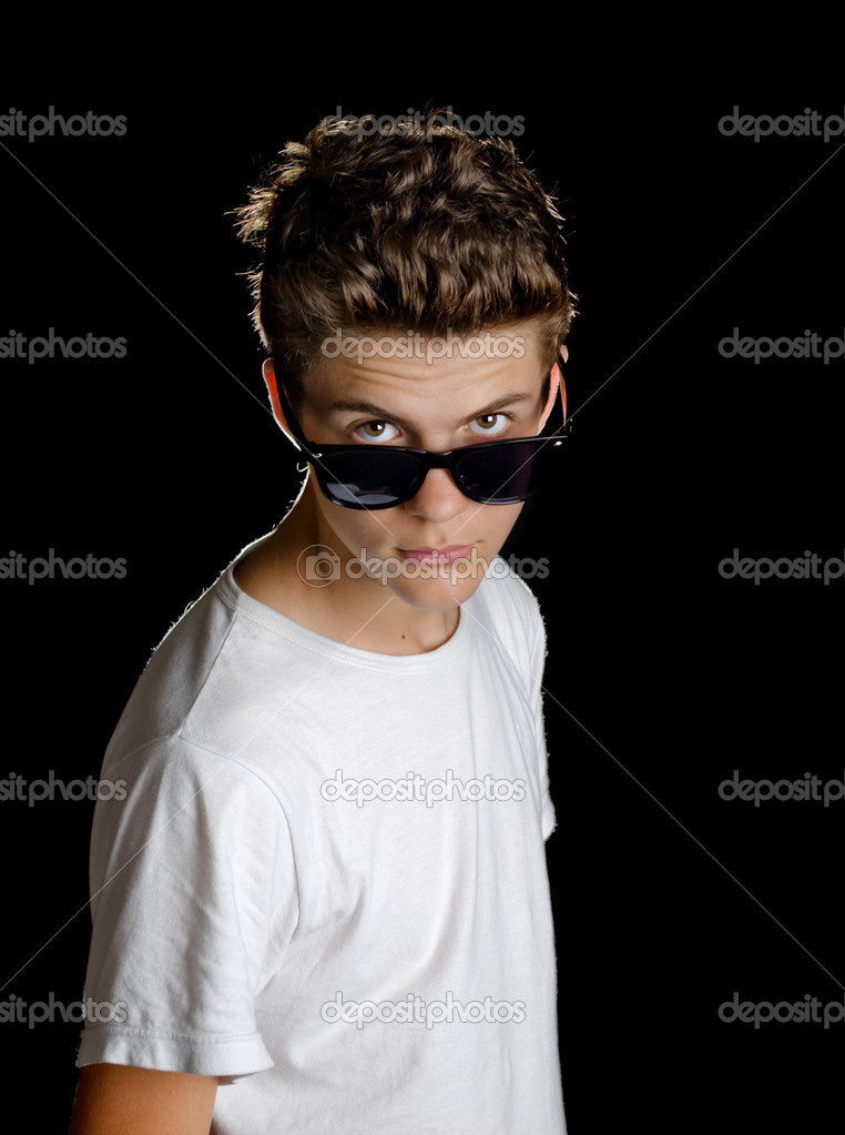 Cute teenage boy with sunglasses — Stock Photo © StarsStudio #33364233