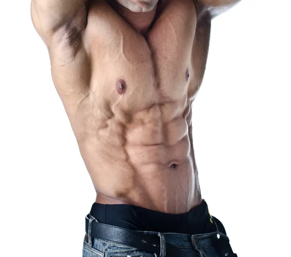 Bodybuilder with arms over his head showing torso — Stock Photo, Image