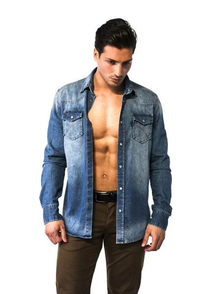 Latin young man with open denim shirt on naked chest. — Stock Photo, Image