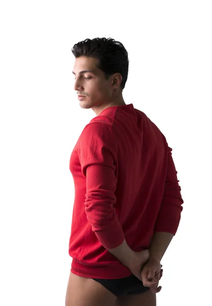 Young man with red wool sweater and underwear — Stock Photo, Image