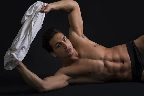 Handsome latin young man naked on floor — Stock Photo, Image