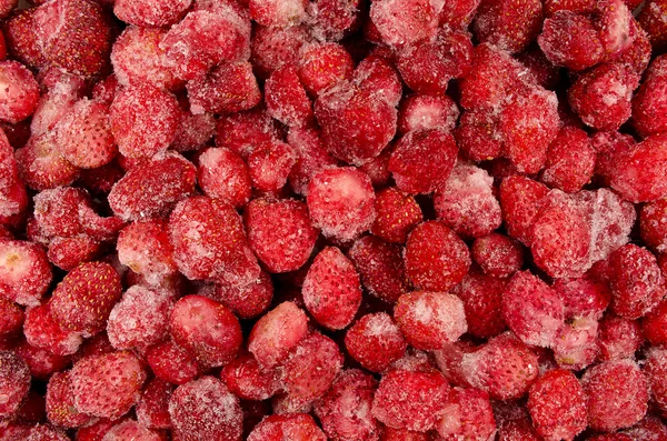 Viele gefrorene Erdbeeren — Stockfoto