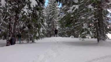 Man Running Away In Winter Forest