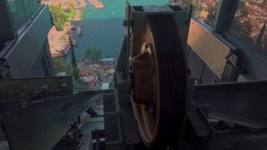 Stainless Steel Wire Ropes slide on iron wheels. Mechanism of Funicular tram.