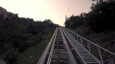 Stainless Steel Wire Ropes slide on iron wheels. Mechanism of Funicular tram.