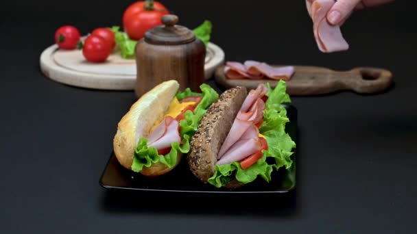 Video Woman Hands Preparing Tasty Sandwiches Ham Cheese Vegetables Black — Stock Video