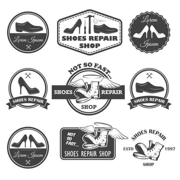 Set of vintage shoes repair labels, emblems and designed element — Stock Vector