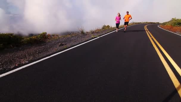 Young Active Couple Running Outside — Stock Video