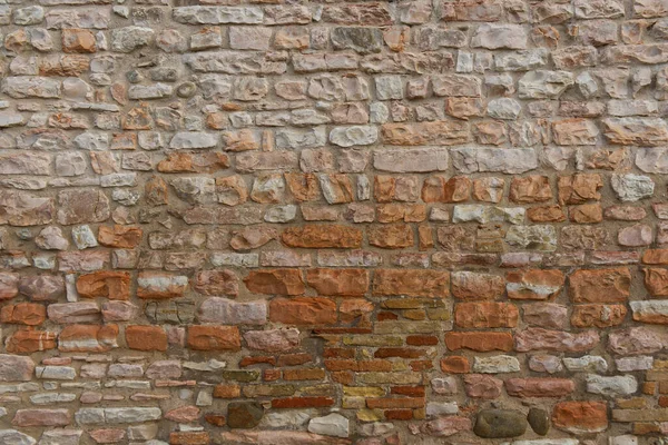 Motif d'un mur de pierre roman — Photo