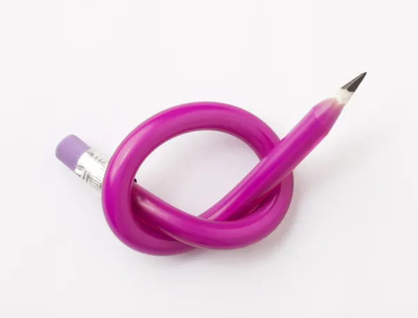 Pencil tied in knot — Stock Photo, Image