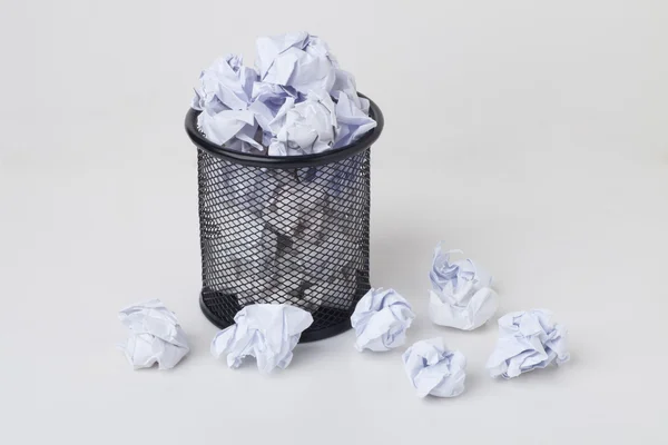 Overflowed wastepaper basket — Stock Photo, Image