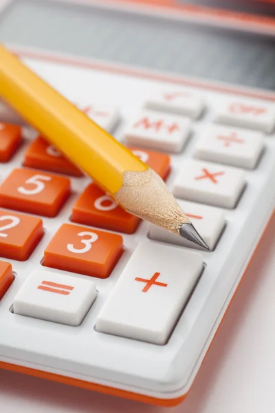 Calculator and pencil — Stock Photo, Image