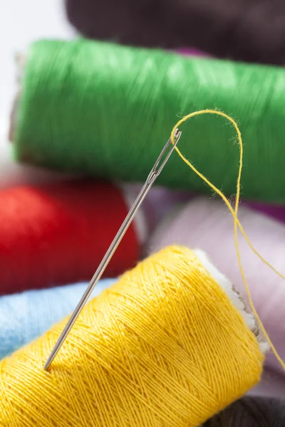 Spool of thread with needle — Stock Photo, Image