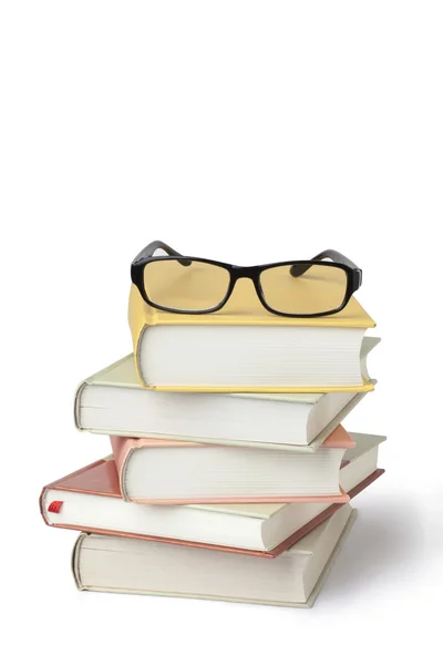 Livros e óculos — Fotografia de Stock
