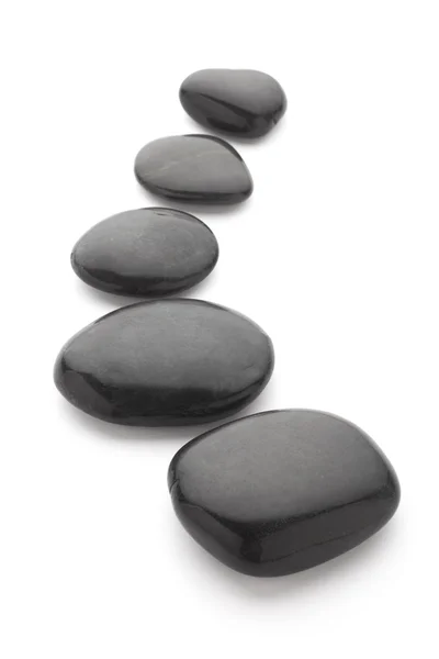 Black massage stones — Stock Photo, Image