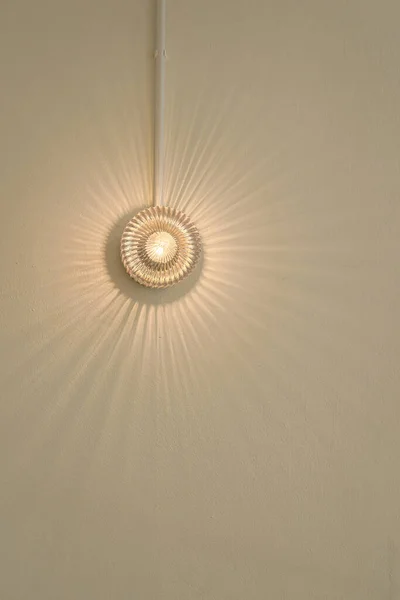 Beautiful Modern Wall Lamp Shape Glass Giving Light Rays Sun — Stock Photo, Image