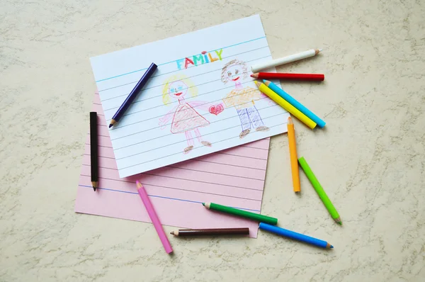 Small colored pencils & a drawing — Stock Photo, Image