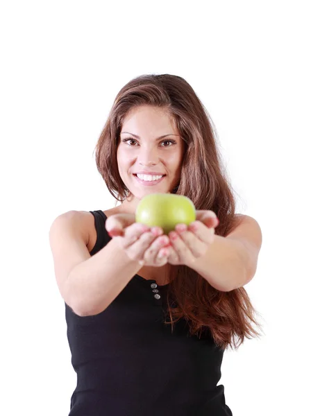 Beautiful smiling girl stretches green apple isolated on white b — Stock Photo, Image