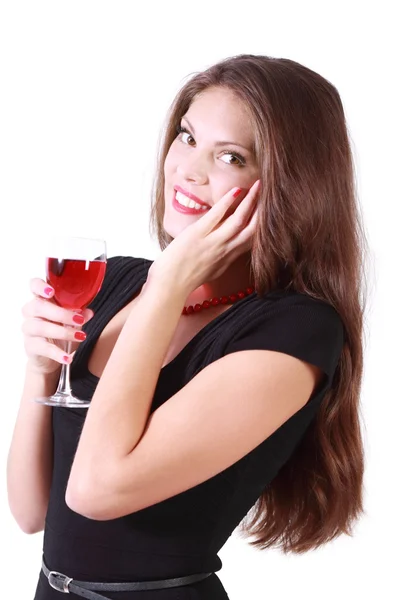 Beautiful smiling girl holds glass of red wine and looks at came — Stock Photo, Image