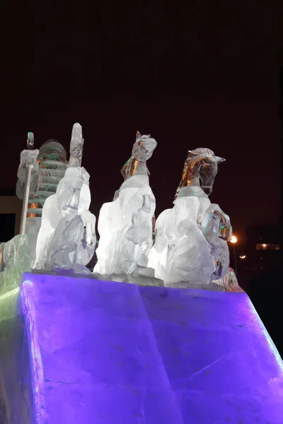 PERM, RUSSIA - JAN 11, 2014: Horse triple sculpture in Ice town — Stock Photo, Image