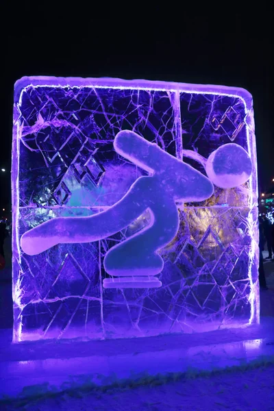 PERM, RUSIA - 11 ENE 2014: Illuminated blue Skater character s —  Fotos de Stock