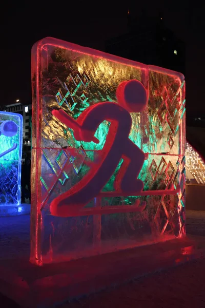 PERM, RÚSSIA - JAN 11, 2014: Iluminated red Skier character scu — Fotografia de Stock