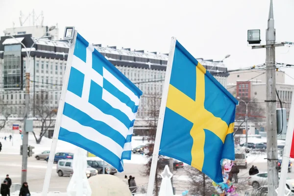 Flag of Greece and Sweden in town — Stock Photo, Image