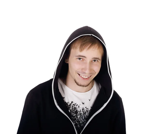 Jonge gelukkig knappe man in zwarte hoodies kijkt naar de camera isolat — Stockfoto