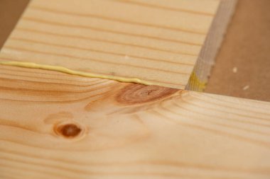 Woodworking. Wood working project 90 degree butt joint with excess glue