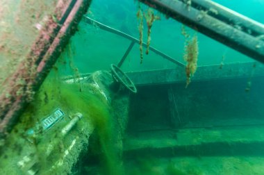 Ottawa OH - August 3rd 2022: Underwater shipwreck Wreck of a recreational speed boat scuttled in a quarry now used as a scuba diving site.