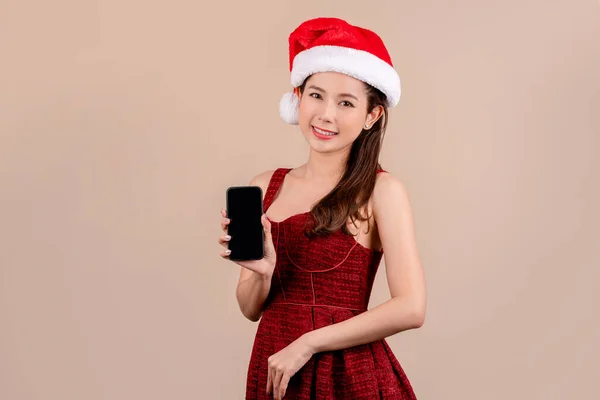 Smiling Pretty Young Santa Woman Christmas Hat Hold Mobile Phone — Stock Photo, Image