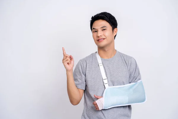 Handsome Asian Man Broken Arm Isolated White Background Having Some — Stock Photo, Image