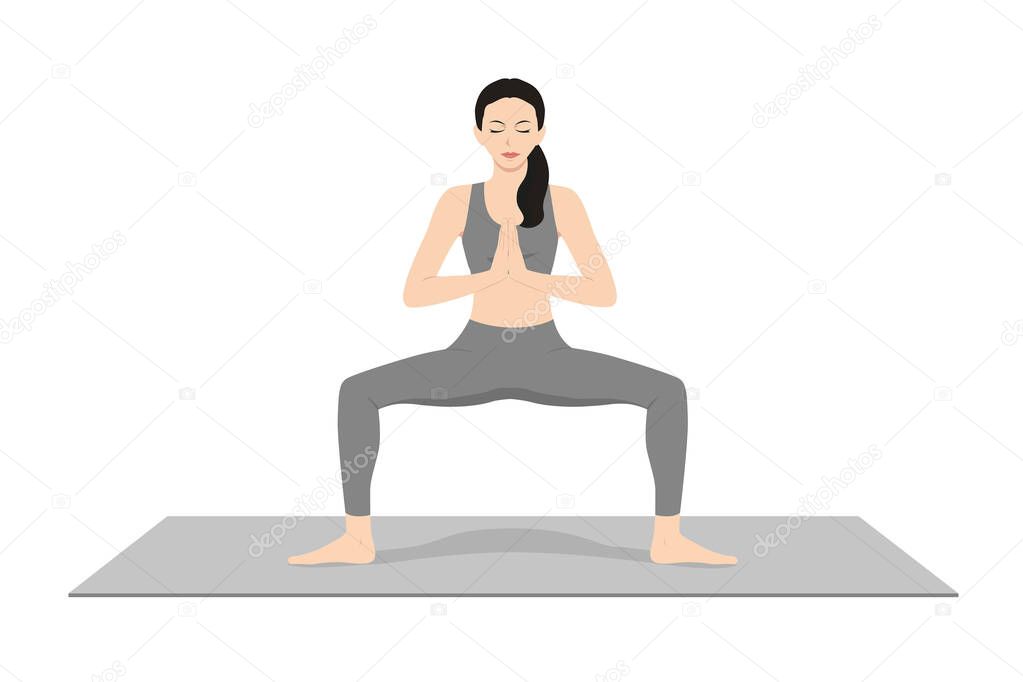 Goddess Pose Prayer Hands, Fierce Angle Pose Prayer Hands, Victory Squat Pose Prayer Hands, Beautiful girl practice Utkata Konasana Namaste Hands. Young attractive woman practicing yoga exercise. working out, black wearing sportswear, grey pants and 