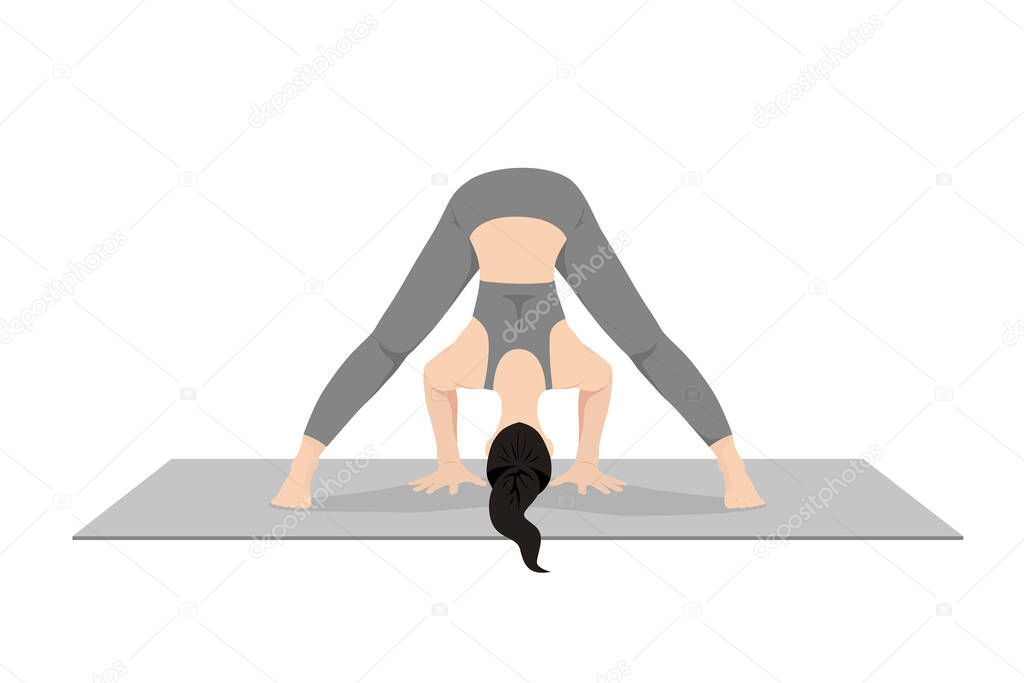 Intense Leg Stretch Pose. Feet Spread Intense Stretch Pose, Wide-Legged Forward Bend Pose. Beautiful girl practice Prasarita Padottanasana. Young attractive woman practicing yoga exercise. working out, black wearing sportswear, grey pants and top, in
