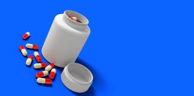 Tablet şişesi. Mavi arka plan. Boşluğu kopyala