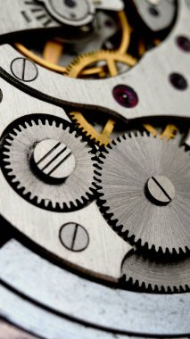 Clockwork. Macro shot of clock mechanism. Gears. Artistic blur
