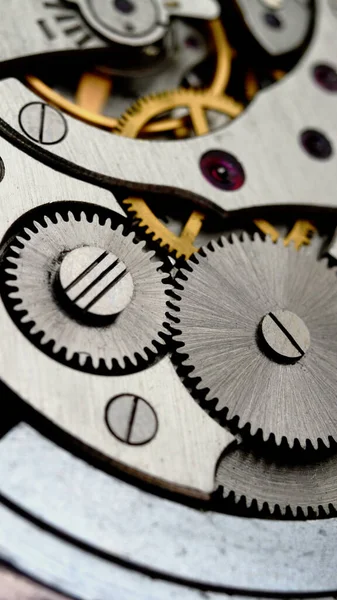 Clockwork. Macro shot of clock mechanism. Gears. Artistic blur