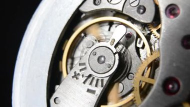 Clockwork. Clock. Macro shot of clock mechanism. Gears. Artistic blur