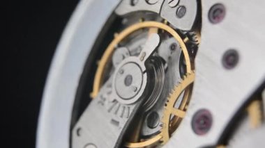 Clockwork. Clock. Macro shot of clock mechanism. Gears. Artistic blur