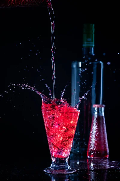 Campari Vodka Splashes Dark Black Background Bottles Liquid Spilled Glass — Fotografia de Stock