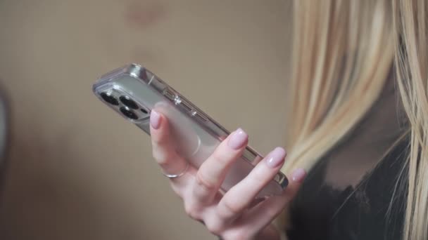 Young Girl Holds Phone Her Hands Browses Sites Internet She — Video Stock