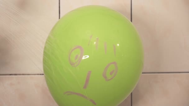 Disgruntled Face Painted Balloon Takes Shower Jets Water Pour Face — Vídeo de stock